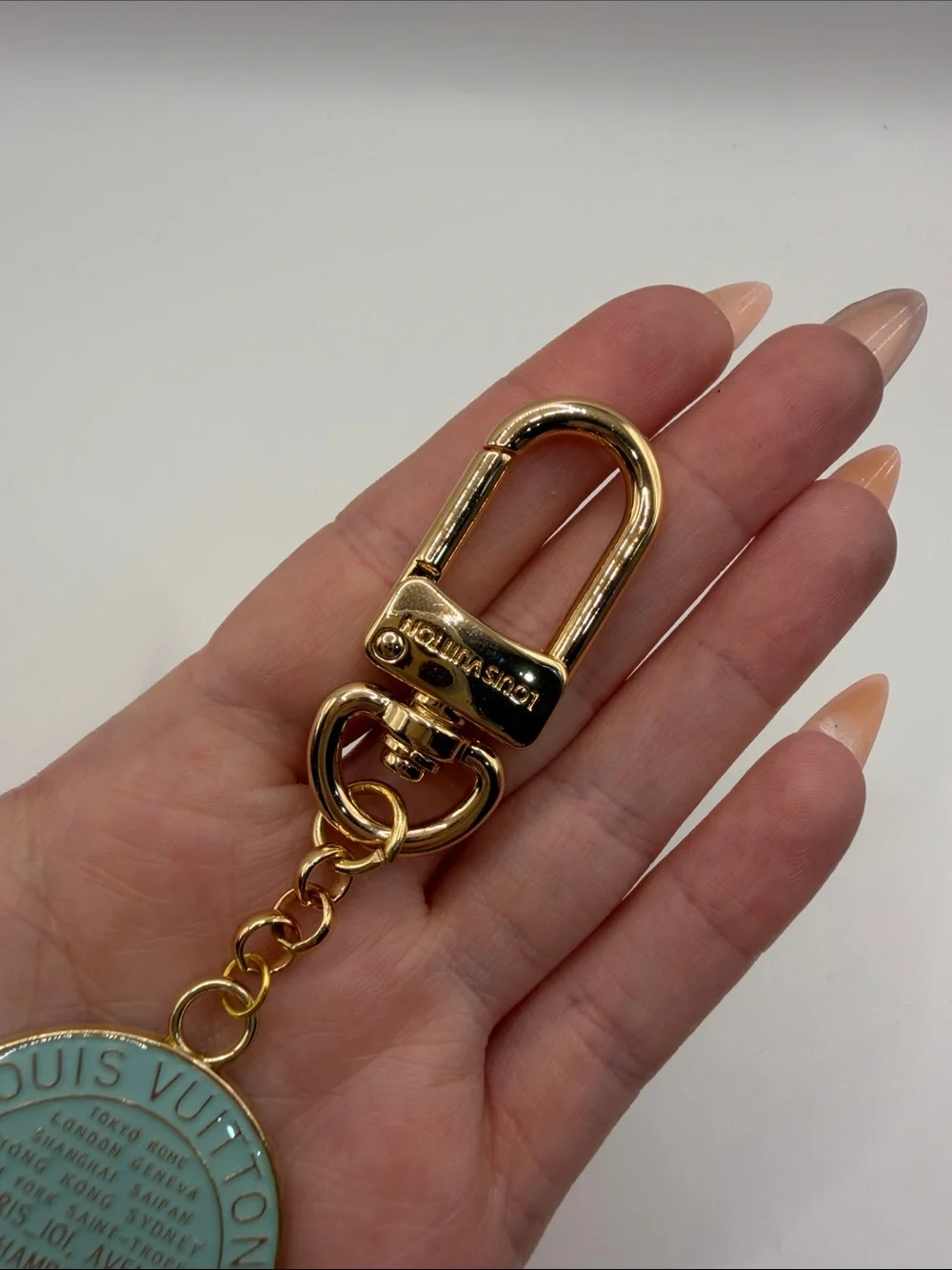 1489. Gold and Teal Round Keychain Charm